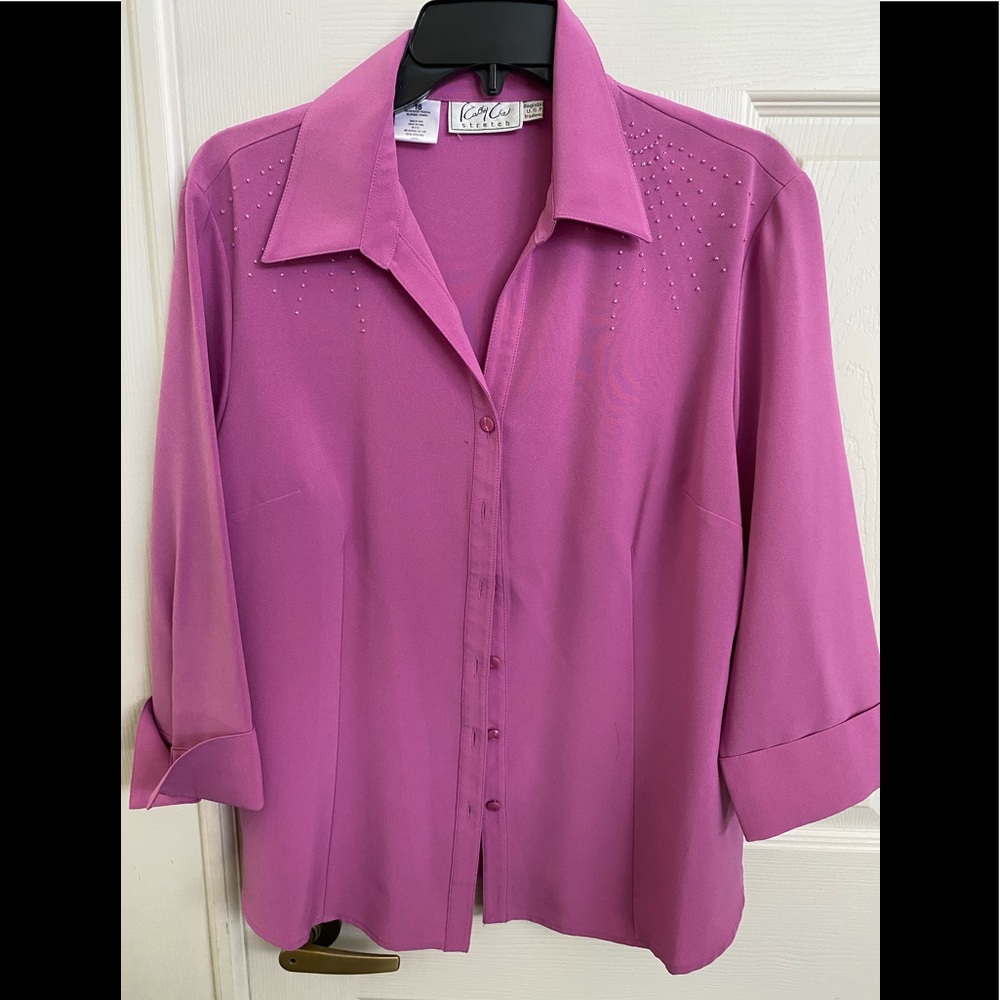 Ladies beautiful beaded shoulders blouse.